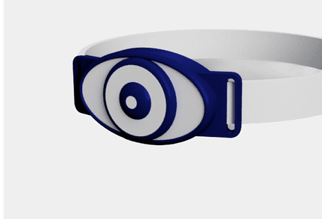 Wearable safety amulet: Worn on the vest to verify helmet, harness, and boot compliance automatically at site turnstiles.