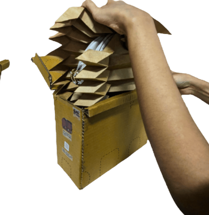 Tessellated board holds the product instead of bubble wrap, and nests flat before folding